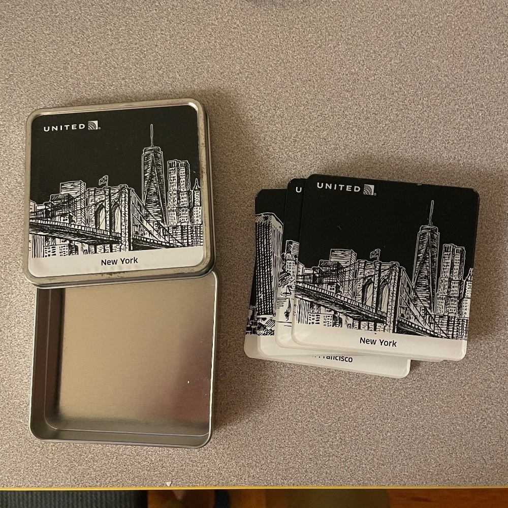 2 United Airlines Acrylic Coaster Sets with original metal cases, 7 pieces total